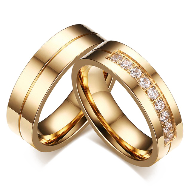 Pair of gold wedding rings 11356618 PNG